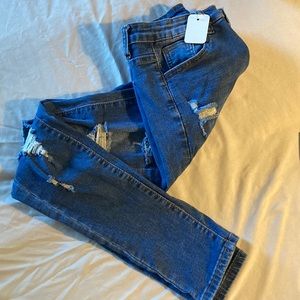 Lightly distressed skinny jean.  Like new.